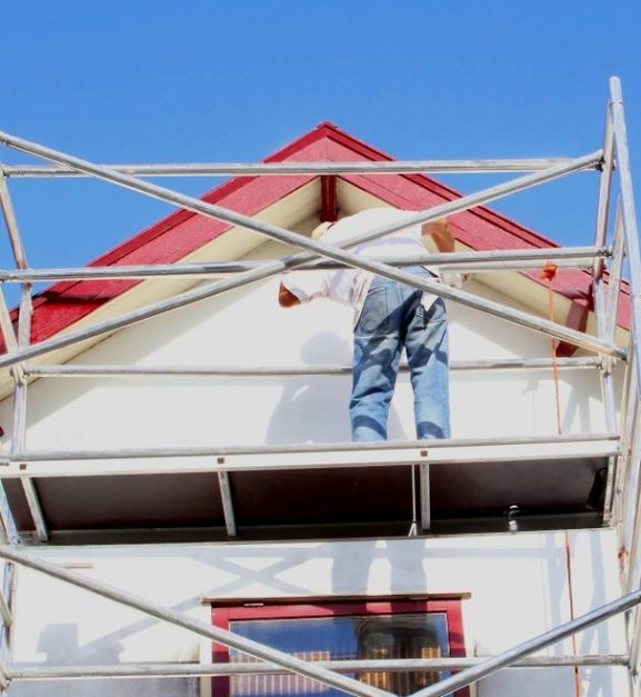 Professional,Workman,Is,Painting,Exterior,Walls,And,Wooden,Window,Frames