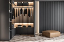 Modern,Wooden,Wardrobe,With,Clothes,Hanging,On,Rail,In,Walk
