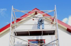Professional,Workman,Is,Painting,Exterior,Walls,And,Wooden,Window,Frames