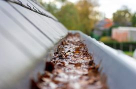 A,Portrait,Of,Inside,Of,A,Clogged,Roof,Gutter,Filled