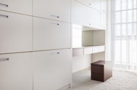 Very,Bright,Dressing,Room,With,Large,White,Cabinets,And,A